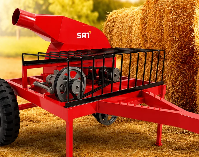 SAT straw loader bhusa loader beside straw bales